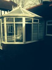 Conservatory with leaded sealed double glazing units replaced due to cloudy condensation on inside of windows.